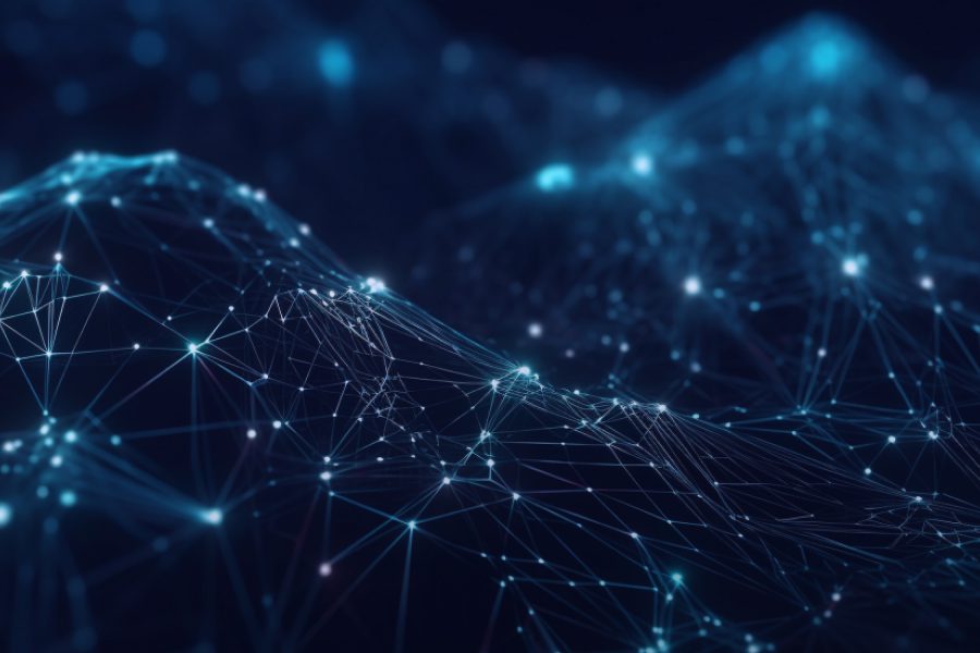 A imagem é uma representação abstrata de uma rede digital ou conexão de dados, com pontos luminosos interligados por linhas finas, formando uma estrutura tridimensional que se assemelha a montanhas ou ondas. Predominam os tons de azul escuro e ciano, com alguns pontos mais brilhantes, criando uma atmosfera futurista e tecnológica.