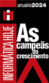 A imagem é um selo de premiação. No lado esquerdo, em fundo vermelho, está escrito na vertical “INFORMÁTICA HOJE”. No canto superior direito, em branco, aparece “anuário 2024”. No centro, em fundo preto, lê-se em branco: “As campeãs do crescimento”. Na parte inferior, há um elemento gráfico em formato de “V” na cor vermelha.